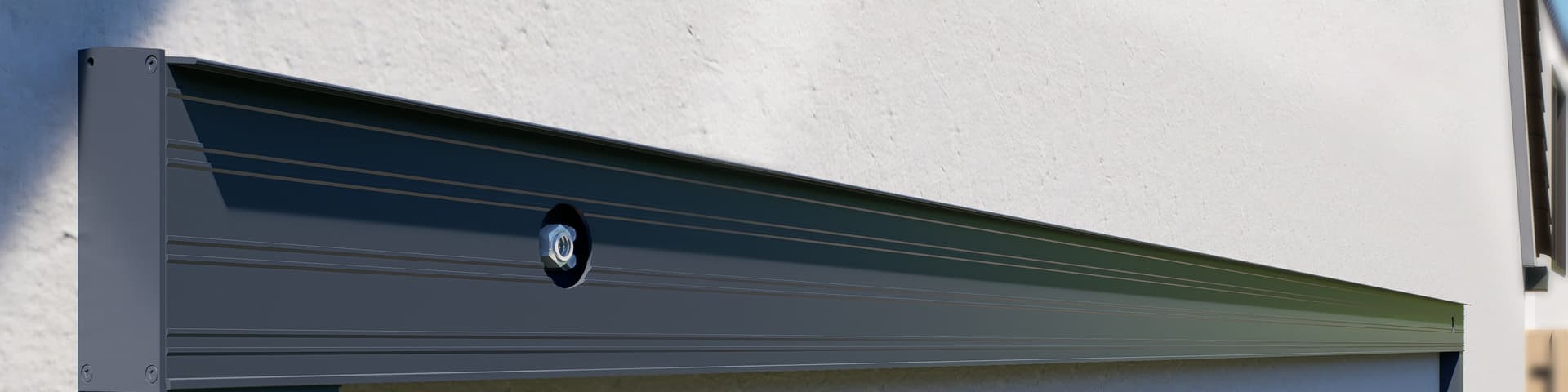 Le système de montage Gumax<sup>®</sup> pour façade avec isolation Système de montage Gumax® pour façade avec isolation anthracite intégré discrètement derrière le profil mural.
